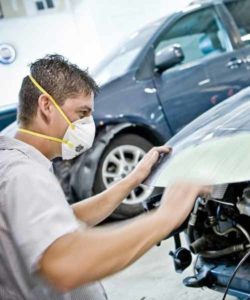 Nissan Collision Repair Omaha worker