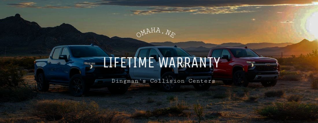 three chevy trucks in a line red white blue dingmans collision center warranty (1) Auto Body Repair Omaha body tech working