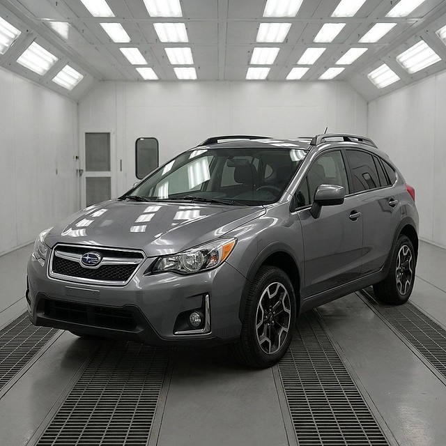 Grey Subaru in paint booth-Auto Body Shop Ohmaha